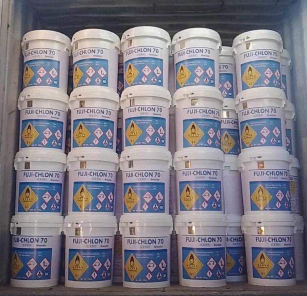 Stacked Fuji-Chlon 70 granular chlorine drums, 45 kg each